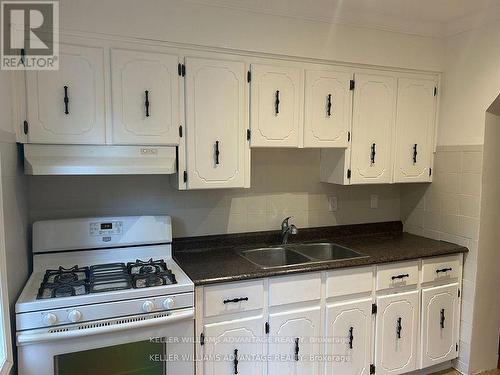 818 Pape Avenue, Toronto (Danforth Village-East York), ON - Indoor Photo Showing Kitchen With Double Sink