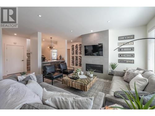 2450 Radio Tower Road Unit# 249, Oliver, BC - Indoor Photo Showing Living Room With Fireplace