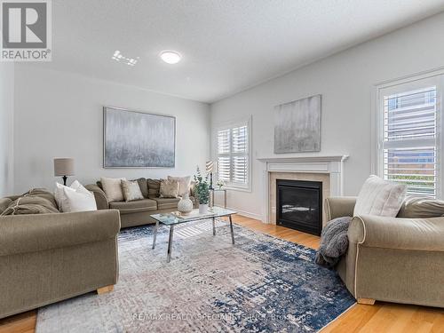 80 Thornbush Boulevard, Brampton, ON - Indoor Photo Showing Living Room With Fireplace