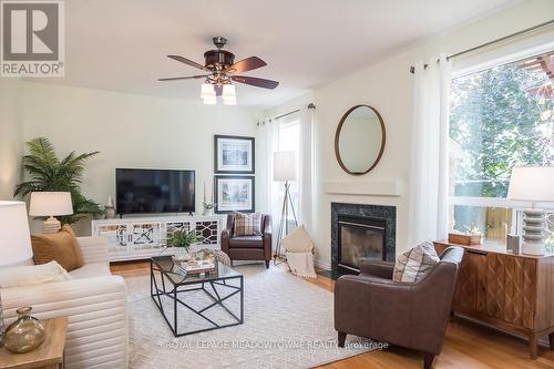 1339 Marshall Crescent, Milton (Beaty), ON - Indoor Photo Showing Living Room With Fireplace