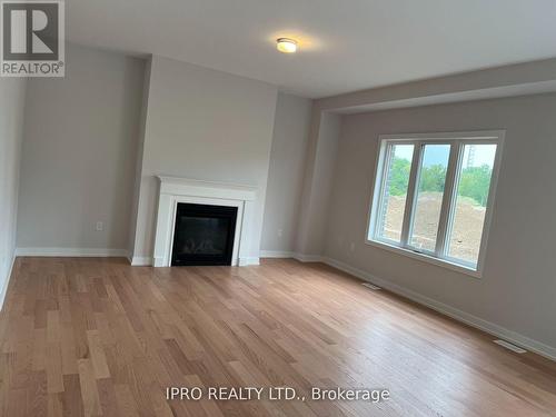 14 Bird Street, Norfolk (Simcoe), ON - Indoor Photo Showing Living Room With Fireplace