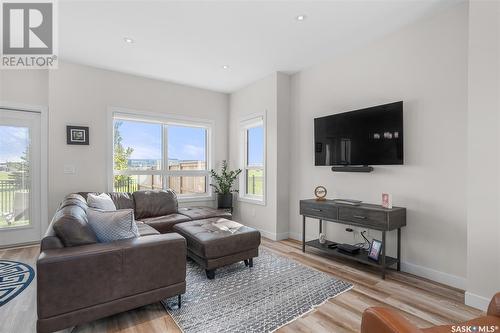 75 619 Evergreen Boulevard, Saskatoon, SK - Indoor Photo Showing Living Room