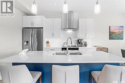 75 619 Evergreen Boulevard, Saskatoon, SK - Indoor Photo Showing Kitchen With Stainless Steel Kitchen With Double Sink With Upgraded Kitchen