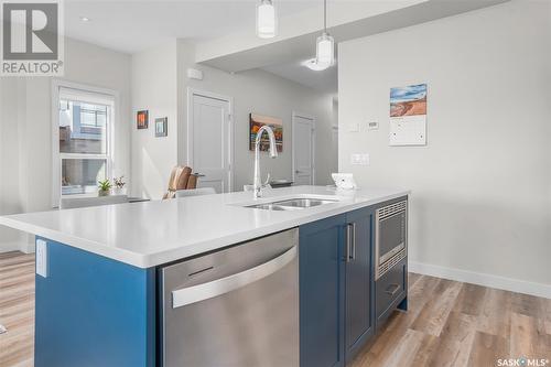 75 619 Evergreen Boulevard, Saskatoon, SK - Indoor Photo Showing Kitchen With Double Sink