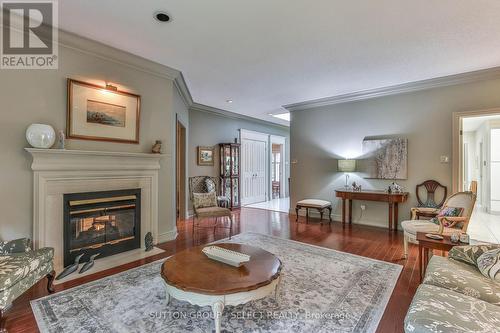 23 - 1200 Riverside Drive, London, ON - Indoor Photo Showing Living Room With Fireplace