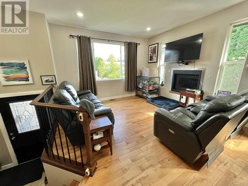 831 Funn Street, Quesnel, BC - Indoor Photo Showing Living Room With Fireplace