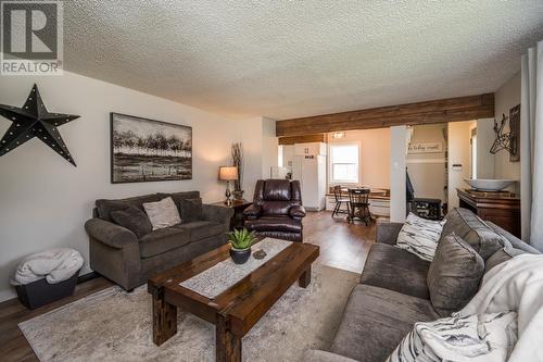 950 Burden Street, Prince George, BC - Indoor Photo Showing Living Room With Fireplace