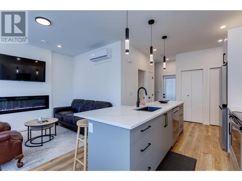 169 Maple Street Unit# 104, Penticton, BC - Indoor Photo Showing Kitchen With Fireplace With Upgraded Kitchen