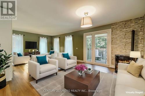 789 Old Mill Road, Kawartha Lakes, ON - Indoor Photo Showing Living Room With Fireplace