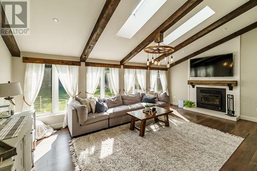 789 Old Mill Road, Kawartha Lakes, ON - Indoor Photo Showing Living Room With Fireplace