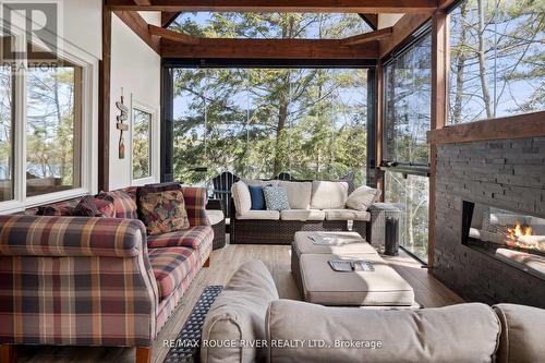 1111 Whitehead Farm Road, Gravenhurst, ON - Indoor Photo Showing Living Room With Fireplace