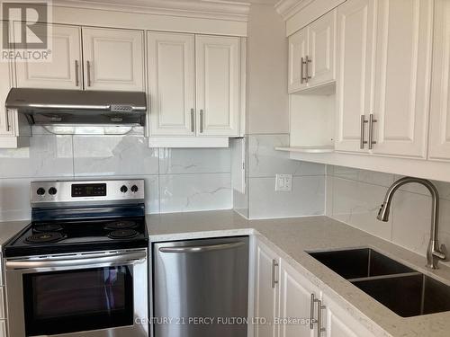 1904 - 10 Sunny Glen Way, Toronto (Flemingdon Park), ON - Indoor Photo Showing Kitchen With Double Sink With Upgraded Kitchen