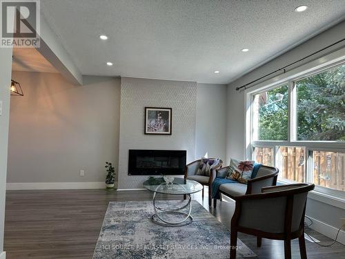 25 - 75 Ansondale Road, London, ON - Indoor Photo Showing Living Room With Fireplace