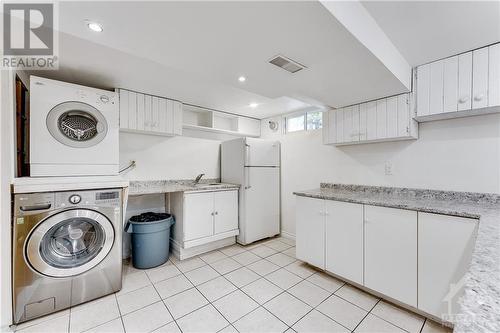 laundry facility and kitchenette - 1125 Woodroffe Avenue, Ottawa, ON - Indoor Photo Showing Laundry Room