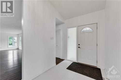 Front Entryway that opens to large great room - 1125 Woodroffe Avenue, Ottawa, ON - Indoor Photo Showing Other Room