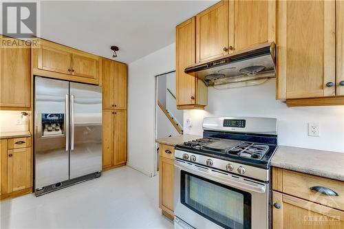 Upgraded appliances - 1125 Woodroffe Avenue, Ottawa, ON - Indoor Photo Showing Kitchen