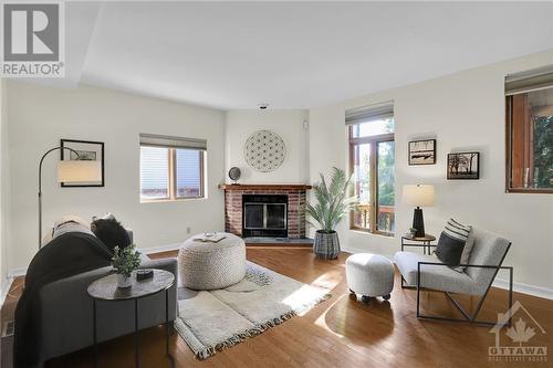 7 Clarey Avenue, Ottawa, ON - Indoor Photo Showing Living Room With Fireplace