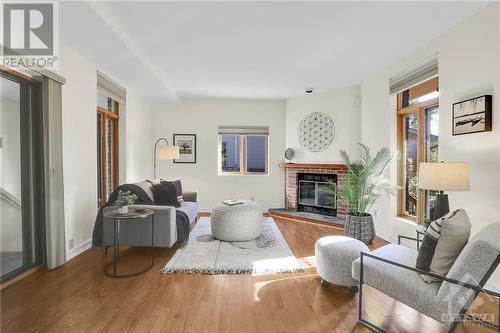 7 Clarey Avenue, Ottawa, ON - Indoor Photo Showing Living Room With Fireplace