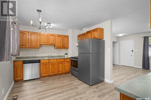 92 Kemp Crescent, Prince Albert, SK - Indoor Photo Showing Kitchen With Double Sink