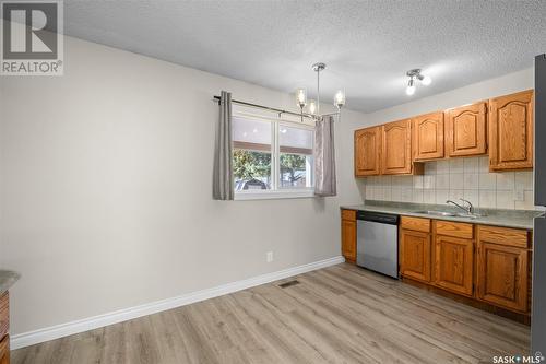 92 Kemp Crescent, Prince Albert, SK - Indoor Photo Showing Kitchen With Double Sink