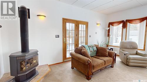 302 2Nd Avenue E, Blaine Lake, SK - Indoor Photo Showing Living Room With Fireplace