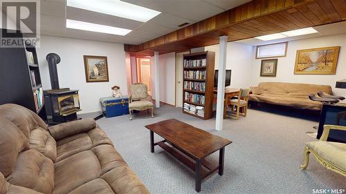 302 2Nd Avenue E, Blaine Lake, SK - Indoor Photo Showing Basement With Fireplace