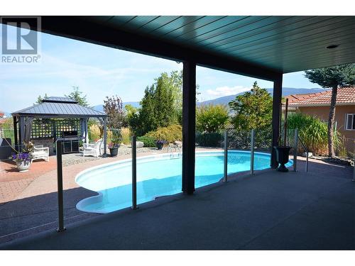 3321 Country Estate Court, Vernon, BC - Outdoor With In Ground Pool With Backyard