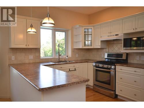 3321 Country Estate Court, Vernon, BC - Indoor Photo Showing Kitchen With Double Sink