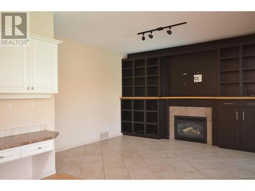 3321 Country Estate Court, Vernon, BC - Indoor Photo Showing Other Room With Fireplace