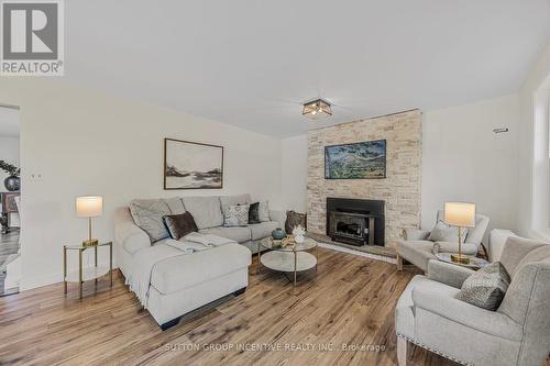 665 4 Line S, Oro-Medonte, ON - Indoor Photo Showing Living Room With Fireplace