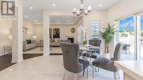 3140 Countess Crescent, Mississauga (Churchill Meadows), ON - Indoor Photo Showing Dining Room With Fireplace