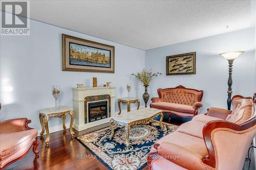 50 Granby Court, Brampton, ON - Indoor Photo Showing Living Room With Fireplace