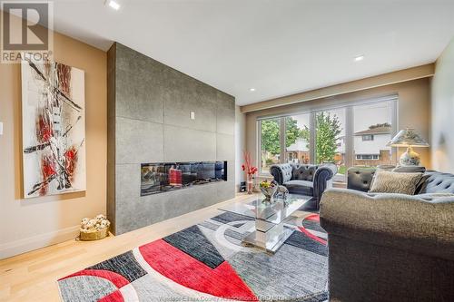 9793 Lynngrove Crescent, Windsor, ON - Indoor Photo Showing Living Room With Fireplace