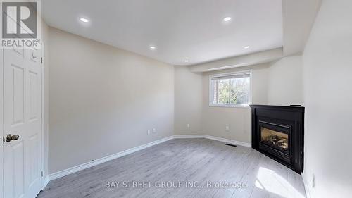 1870 Woodgate Court, Oshawa (Samac), ON - Indoor Photo Showing Other Room With Fireplace