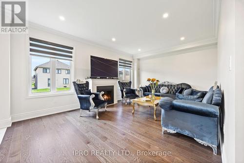 14 Hummingbird Grove, Adjala-Tosorontio (Colgan), ON - Indoor Photo Showing Living Room With Fireplace