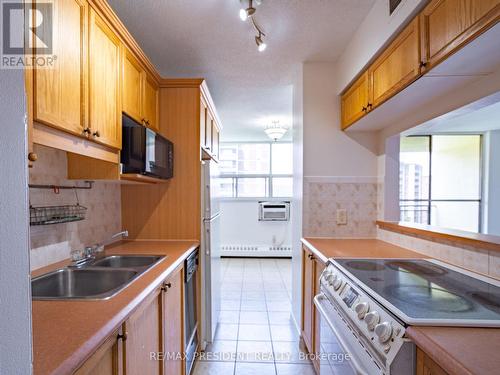 701 - 1950 Main Street West, Hamilton (Ainslie Wood), ON - Indoor Photo Showing Kitchen With Double Sink