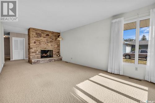 18 Procter Place, Regina, SK - Indoor With Fireplace