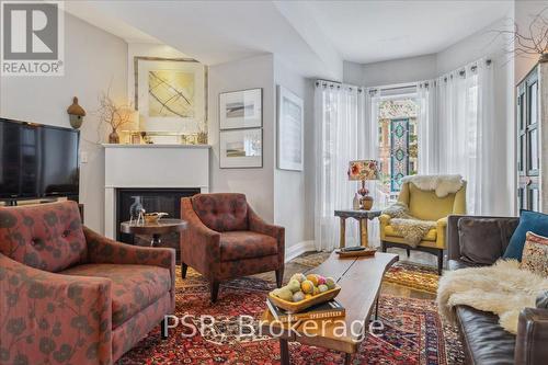 109 Ontario Avenue, Hamilton, ON - Indoor Photo Showing Living Room With Fireplace