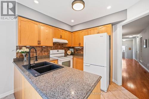 21 Caleche Avenue, Clarington (Courtice), ON - Indoor Photo Showing Kitchen With Double Sink