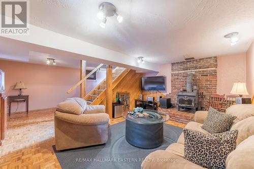 880 Clinton Avenue, Douro-Dummer, ON - Indoor Photo Showing Living Room With Fireplace