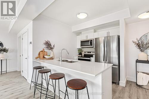 324 - 4 Kimberly Lane, Collingwood, ON - Indoor Photo Showing Kitchen With Double Sink With Upgraded Kitchen