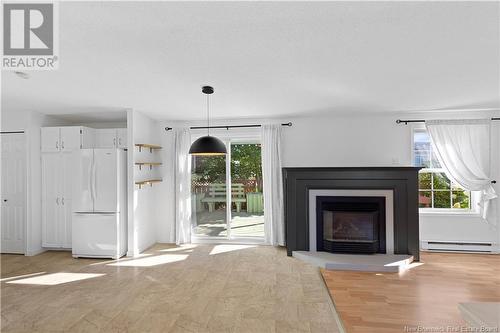 19 Anemone Street, Moncton, NB - Indoor Photo Showing Living Room With Fireplace