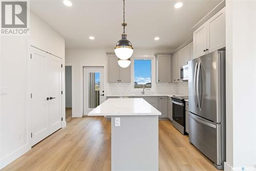 14 105 Hathway Crescent, Saskatoon, SK - Indoor Photo Showing Kitchen With Stainless Steel Kitchen With Upgraded Kitchen