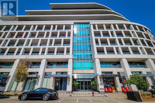 323 - 11 Bronte Road, Oakville (Bronte West), ON - Outdoor With Balcony With Facade