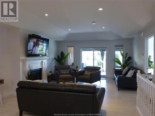 1041 Branoff, Lasalle, ON - Indoor Photo Showing Living Room With Fireplace