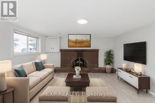 45 Acadia Crescent, St. Catharines, ON - Indoor Photo Showing Living Room With Fireplace