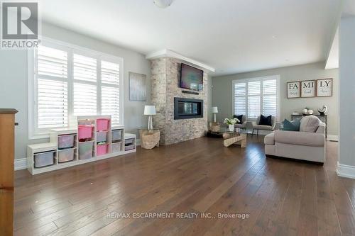 958 Beach Boulevard, Hamilton (Hamilton Beach), ON - Indoor Photo Showing Living Room With Fireplace