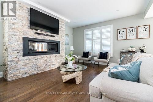 958 Beach Boulevard, Hamilton (Hamilton Beach), ON - Indoor Photo Showing Living Room With Fireplace