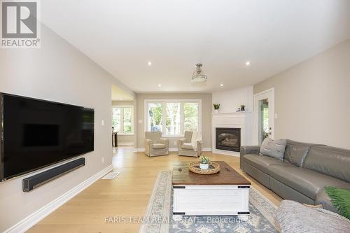 70 Copeland Creek Drive, Tiny, ON - Indoor Photo Showing Living Room With Fireplace