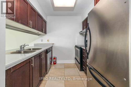 909 - 10 Laurelcrest Street, Brampton, ON - Indoor Photo Showing Kitchen With Double Sink